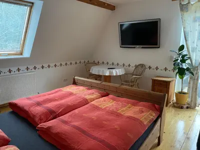 Ein Bett oder Betten in einem Zimmer der Unterkunft Übernachten im Grünen