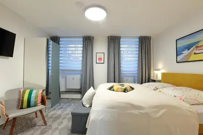 Ein Bett oder Betten in einem Zimmer der Unterkunft N15 - Room22 Apartment Familyhouse