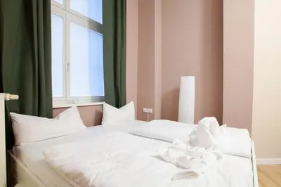 Ein Bett oder Betten in einem Zimmer der Unterkunft Atelier Rosé