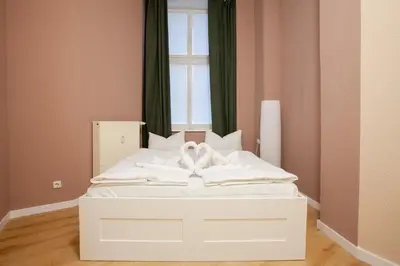 Ein Bett oder Betten in einem Zimmer der Unterkunft Atelier Rosé