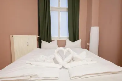 Ein Bett oder Betten in einem Zimmer der Unterkunft Atelier Rosé