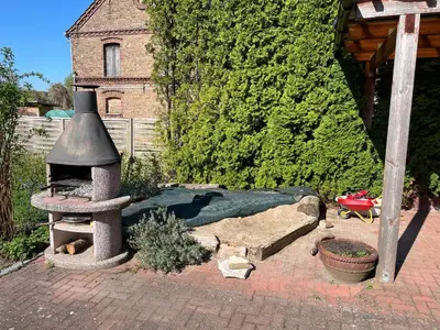 Ein Garten an der Unterkunft Großzügige Ferienwohnung nahe Berlin