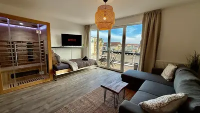 TV/Unterhaltungsangebot in der Unterkunft Modernes Apartment im Boho Style