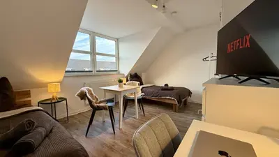TV/Unterhaltungsangebot in der Unterkunft Modernes Apartment im Boho Style