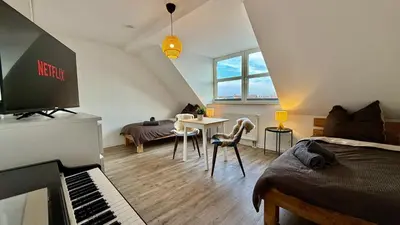 TV/Unterhaltungsangebot in der Unterkunft Modernes Apartment im Boho Style