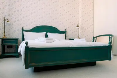 Ein Bett oder Betten in einem Zimmer der Unterkunft Hotel-Restaurant Alt Karow