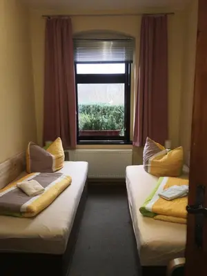 Ein Bett oder Betten in einem Zimmer der Unterkunft Haus H&M Ferienwohnung 4