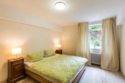 Ein Bett oder Betten in einem Zimmer der Unterkunft Charming Garden Apartment
