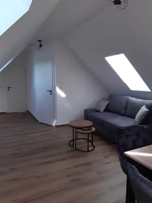Ein Sitzbereich in der Unterkunft Oderbruch Ferienwohnung Am Speicher