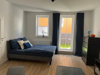 Ein Sitzbereich in der Unterkunft Gutshof von Gemünden Ferienwohnung 3