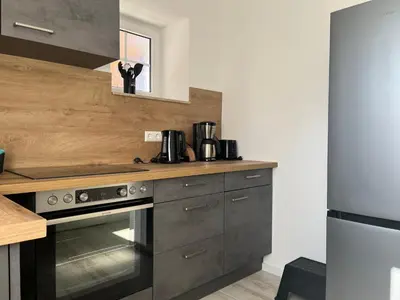 Küche/Küchenzeile in der Unterkunft Gutshof von Gemünden Ferienwohnung 3