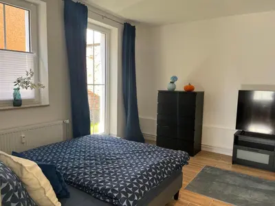 Ein Bett oder Betten in einem Zimmer der Unterkunft Gutshof von Gemünden Ferienwohnung 3