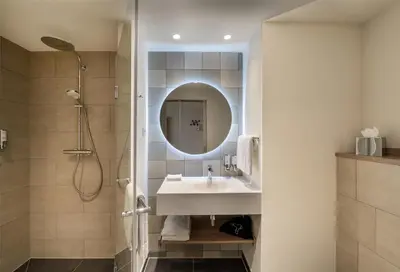 Ein Badezimmer in der Unterkunft Hampton By Hilton Potsdam Babelsberg