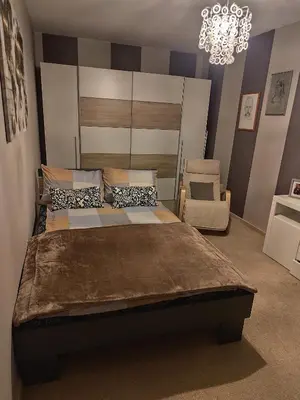 Ein Bett oder Betten in einem Zimmer der Unterkunft Ferienhaus mit 2 Schlafzimmern