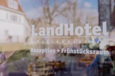 Ein Zertifikat, Auszeichnung, Logo oder anderes Dokument, das in der Unterkunft LandHotel ausgestellt ist
