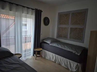 Ein Bett oder Betten in einem Zimmer der Unterkunft PuraVida Apartments Berlin Heiligensee