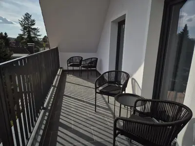 Ein Balkon oder eine Terrasse in der Unterkunft PuraVida Apartments Berlin Heiligensee