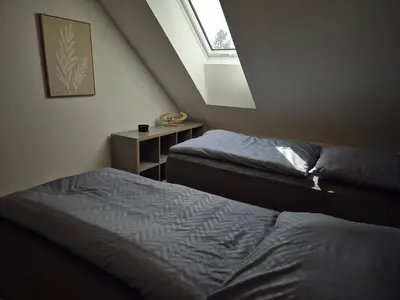 Ein Bett oder Betten in einem Zimmer der Unterkunft PuraVida Apartments Berlin Heiligensee