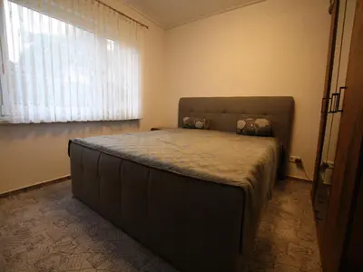 Ein Bett oder Betten in einem Zimmer der Unterkunft Teupitz Lakeside Escape