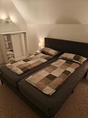 Ein Bett oder Betten in einem Zimmer der Unterkunft Ferienwohnung in Kleinstadt nähe Spreewald