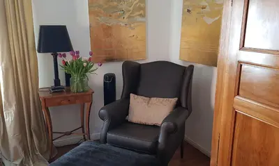 Ein Sitzbereich in der Unterkunft Remise Heiliger See