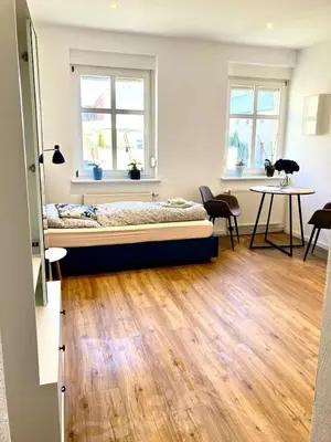 Ein Bett oder Betten in einem Zimmer der Unterkunft Studio Versteck am Hug