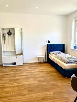 Ein Bett oder Betten in einem Zimmer der Unterkunft Studio Versteck am Hug