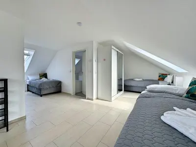 Ein Bett oder Betten in einem Zimmer der Unterkunft Appartementhaus