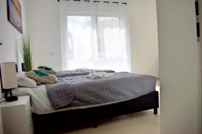 Ein Bett oder Betten in einem Zimmer der Unterkunft Appartementhaus