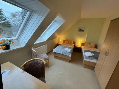 Ein Bett oder Betten in einem Zimmer der Unterkunft Haus Katharinensee