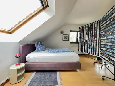 Ein Bett oder Betten in einem Zimmer der Unterkunft Ferienwohnung am Berliner Stadtrand