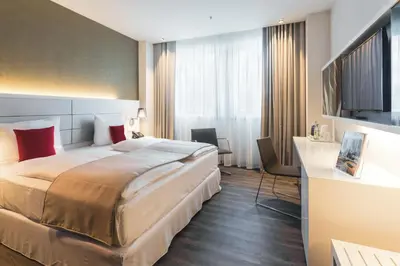 Ein Bett oder Betten in einem Zimmer der Unterkunft Riu Plaza Berlin