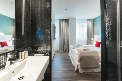 Ein Bett oder Betten in einem Zimmer der Unterkunft Riu Plaza Berlin