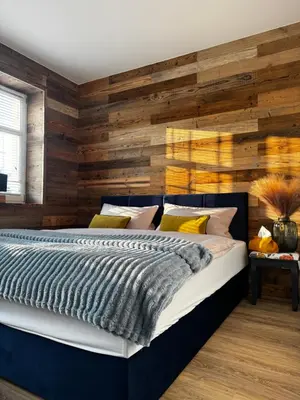 Ein Bett oder Betten in einem Zimmer der Unterkunft Posthaus Kloster Zinna