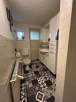 Ein Badezimmer in der Unterkunft FeWo am Mainplatz