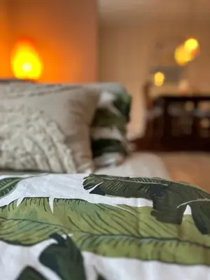 Ein Bett oder Betten in einem Zimmer der Unterkunft FeWo am Mainplatz