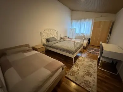Ein Bett oder Betten in einem Zimmer der Unterkunft Ferienhaus nahe Berlin Bungalow mit Kamin