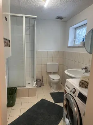 Ein Badezimmer in der Unterkunft Ferienhaus nahe Berlin Bungalow mit Kamin