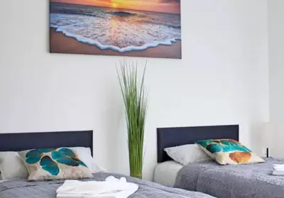 Ein Bett oder Betten in einem Zimmer der Unterkunft Appartementhaus