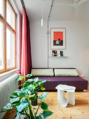 Ein Sitzbereich in der Unterkunft Flattering Suites