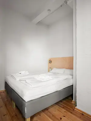 Ein Bett oder Betten in einem Zimmer der Unterkunft Flattering Suites