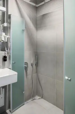 Ein Badezimmer in der Unterkunft Flattering Suites