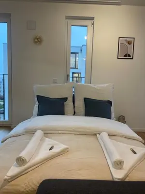 Ein Bett oder Betten in einem Zimmer der Unterkunft Gemütliches Apartment am BER Flughafen