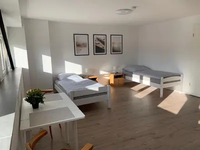 Ein Bett oder Betten in einem Zimmer der Unterkunft Seenland Fewo - 4