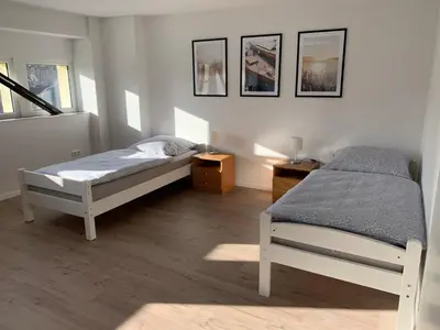 Ein Bett oder Betten in einem Zimmer der Unterkunft Seenland Fewo - 4