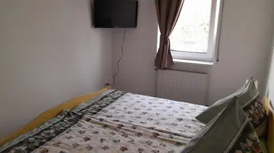 Ein Bett oder Betten in einem Zimmer der Unterkunft Ferienwohnungen Beetzseeheide