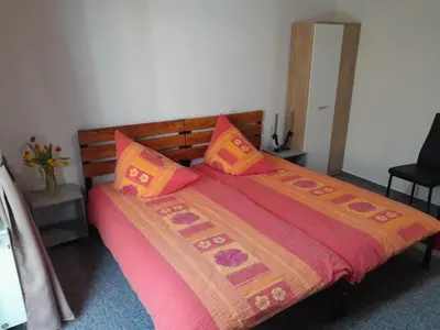Ein Bett oder Betten in einem Zimmer der Unterkunft Ferienwohnungen Beetzseeheide