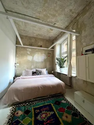 Ein Bett oder Betten in einem Zimmer der Unterkunft Artisanal Warehouse Conversion