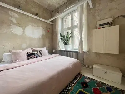 Ein Bett oder Betten in einem Zimmer der Unterkunft Artisanal Warehouse Conversion