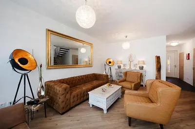 Ein Sitzbereich in der Unterkunft Appartement in Strausberg mit Frühstück inklusive